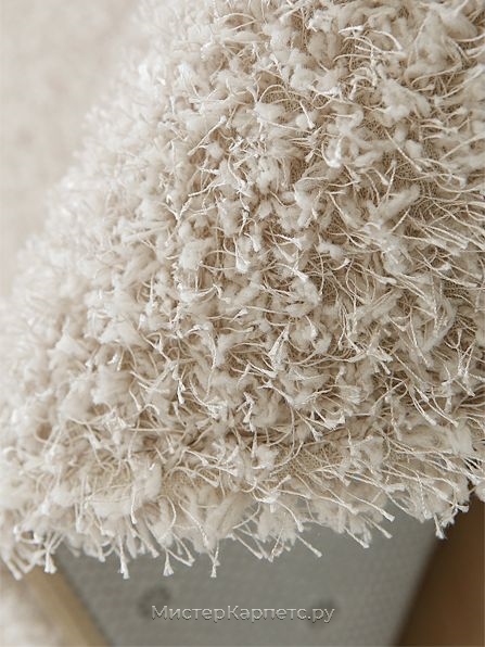 Круглый бежевый ковер с ворсом Refly