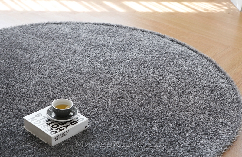 Круглый серый длинноворсный ковер Lordliness