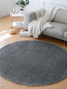 Круглый серый длинноворсный ковер Lordliness