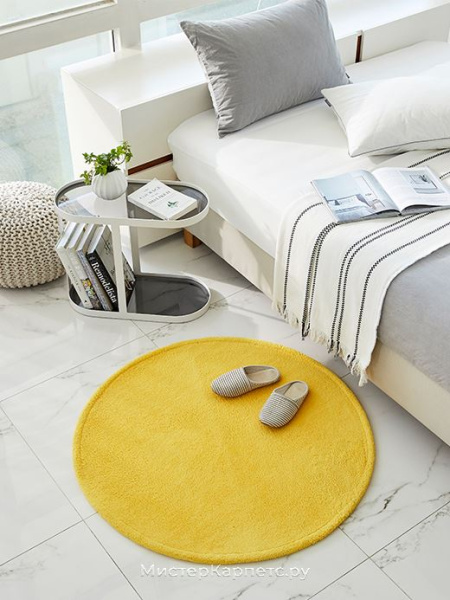 Круглый желтый ковер без рисунка Century
