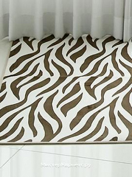 Коричневый ковер с рисунком Wawe