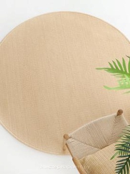 Круглый бежевый безворсовый ковер с имитацией ротанга Capri