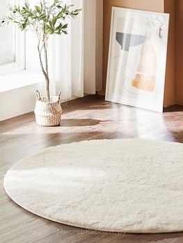 Круглый ковер с длинным ворсом цвета слоновой кости Softy